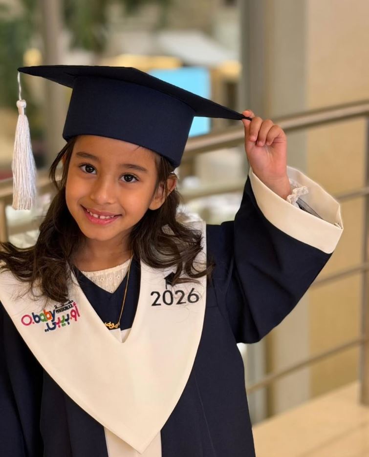 O.baby Preschool graduate in cap and gown